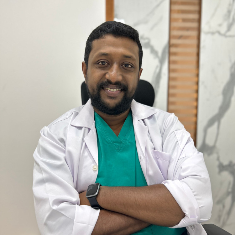 Dr. Thomas V Issac MDS - Endodontist at Yoha Dental Clinic